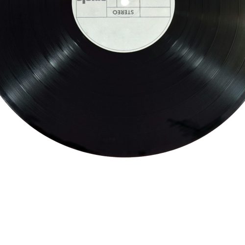 pexels-photo-167092-167092 A classic black vinyl record isolated on a white background.